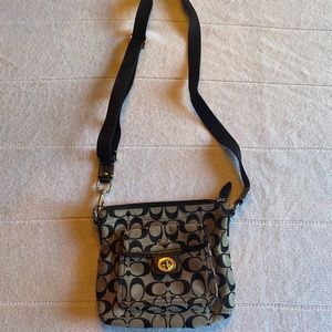 The Classic black crossbody bag by Coach